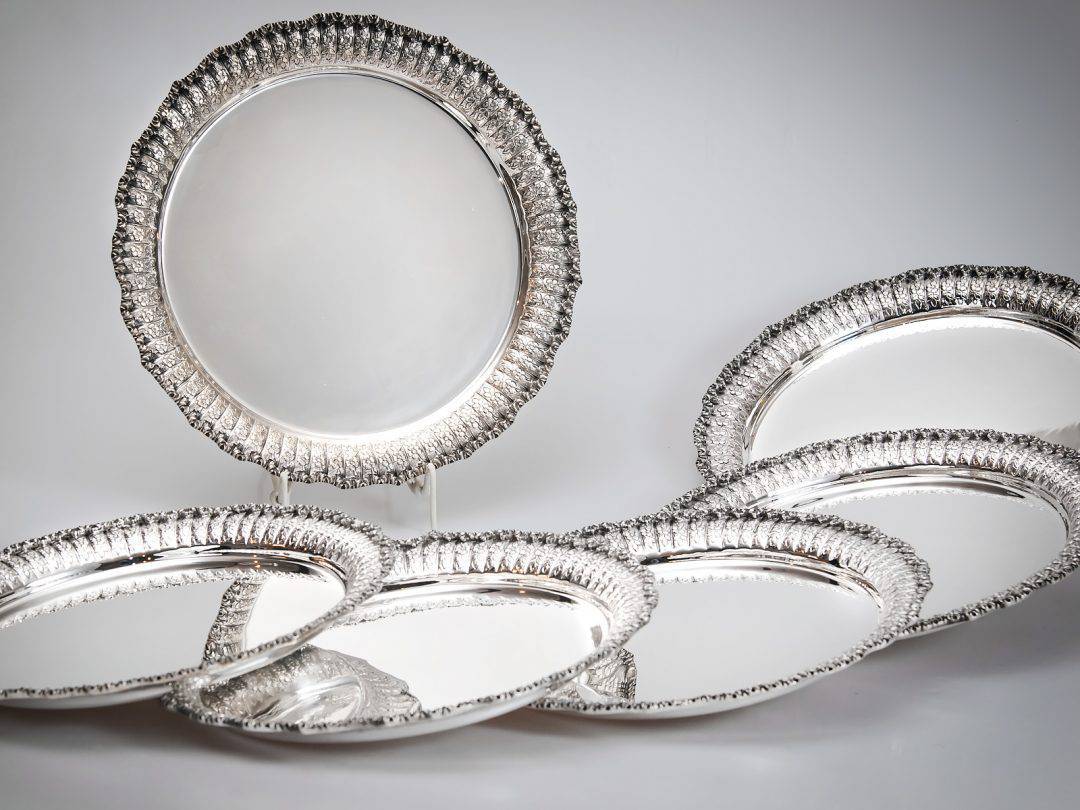 Set di dodici sottopiatti in argento
